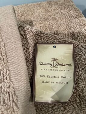 Tommy Bahama bath towel and 2 was clothes